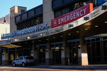 An exterior shot of the Hennepin County Medical Center emergency room entrance.