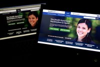 A photo of two laptops with the HealthCare.gov website open.