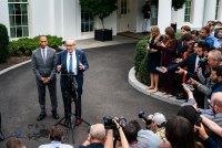 A photo of Hakeem Jeffries and Chuck Schumer holding a news conference.