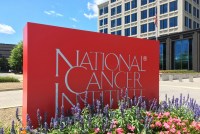 A photo of a sign outside the National Cancer Institute's campus in Rockville, Maryland.